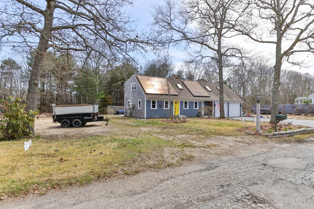 8 Trotters Lane Barnstable, MA 02648 - Photo 39 of 41 a front view of a house with a big yard