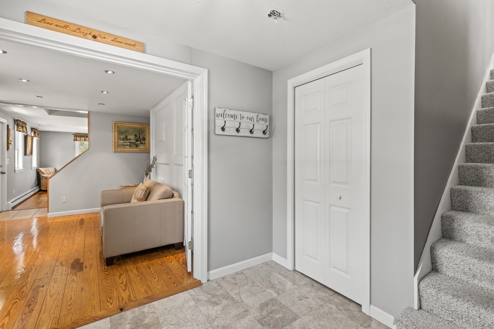 8 Trotters Lane Barnstable, MA 02648 - Photo 6 of 41 a living room with furniture and a wooden floor