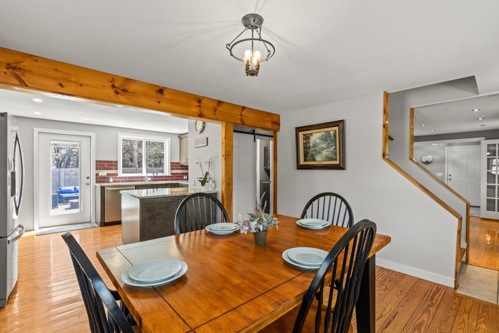 8 Trotters Lane Barnstable, MA 02648 - Photo 8 of 41 a dining room with furniture and wooden floor