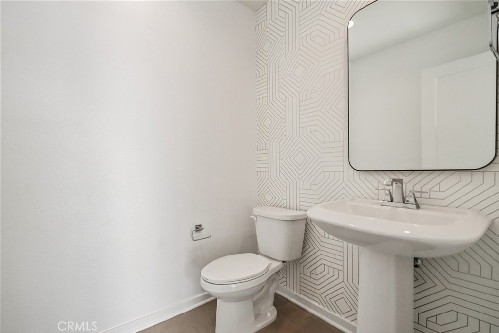 170 Fable Irvine, CA 92618 - Photo 18 of 27 a bathroom with a sink toilet and mirror