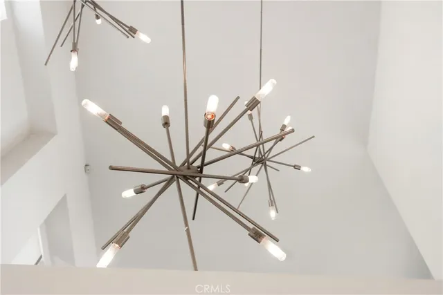 a view of a staircase with white walls