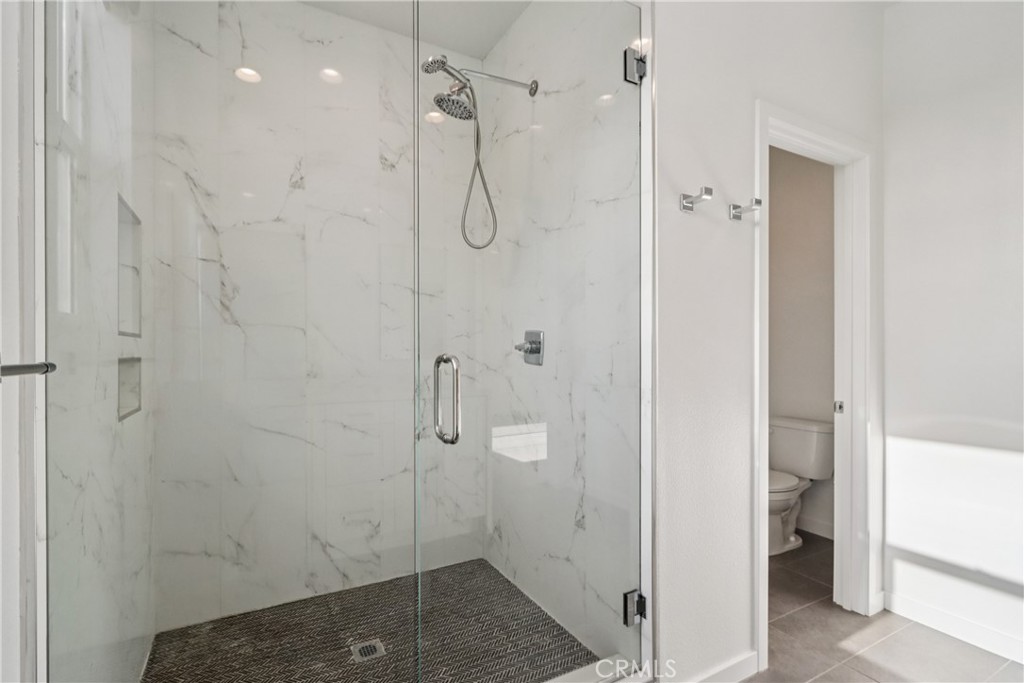 170 Fable Irvine, CA 92618 - Photo 24 of 27 a bathroom with a shower