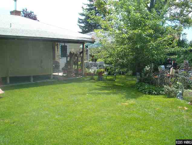 765 Bates Avenue Reno, NV 89502 - Photo 6 of 9 a front view of a house with garden