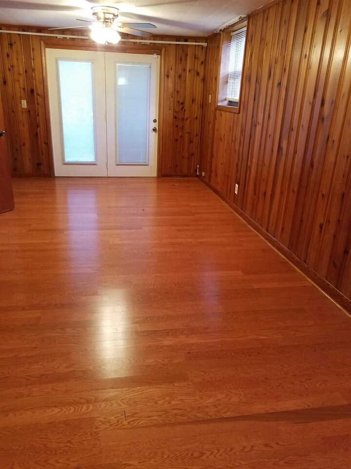 3184 Gay Drive Decatur, GA 30032 - Photo 12 of 18 a view of a room with wooden floor and windows