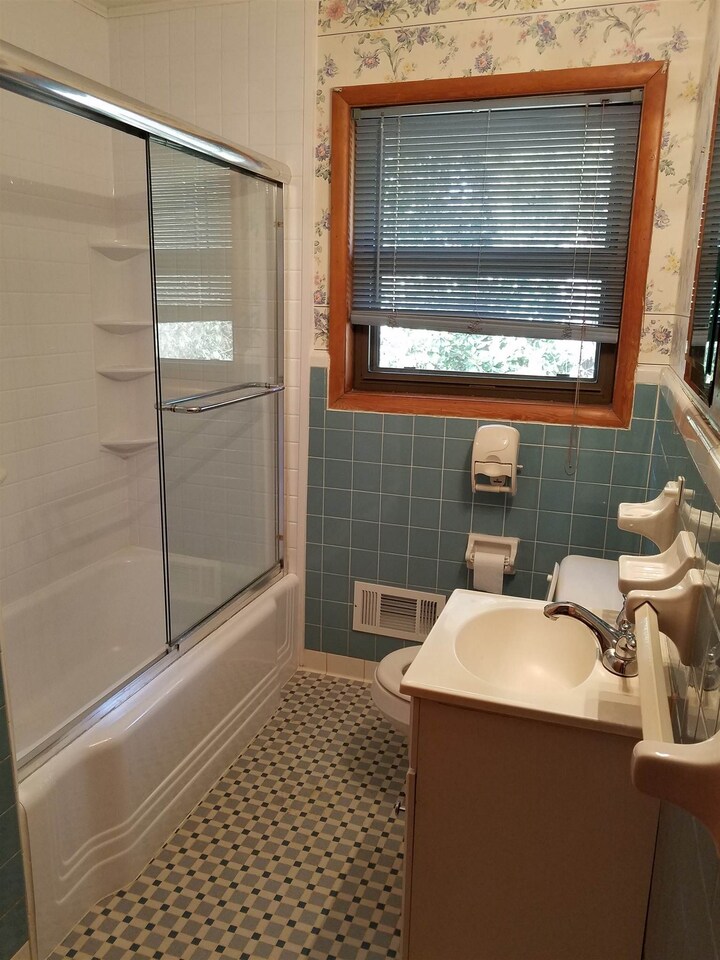 3184 Gay Drive Decatur, GA 30032 - Photo 16 of 18 a bathroom with a sink and a shower