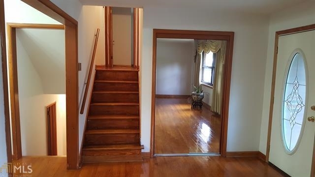 3184 Gay Drive Decatur, GA 30032 - Photo 9 of 18 a view of a hallway with wooden floor and entryway