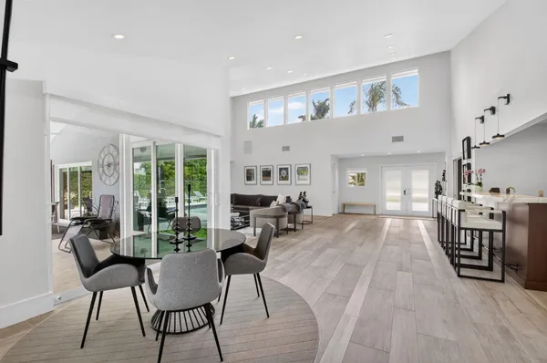 a living room with furniture and a table
