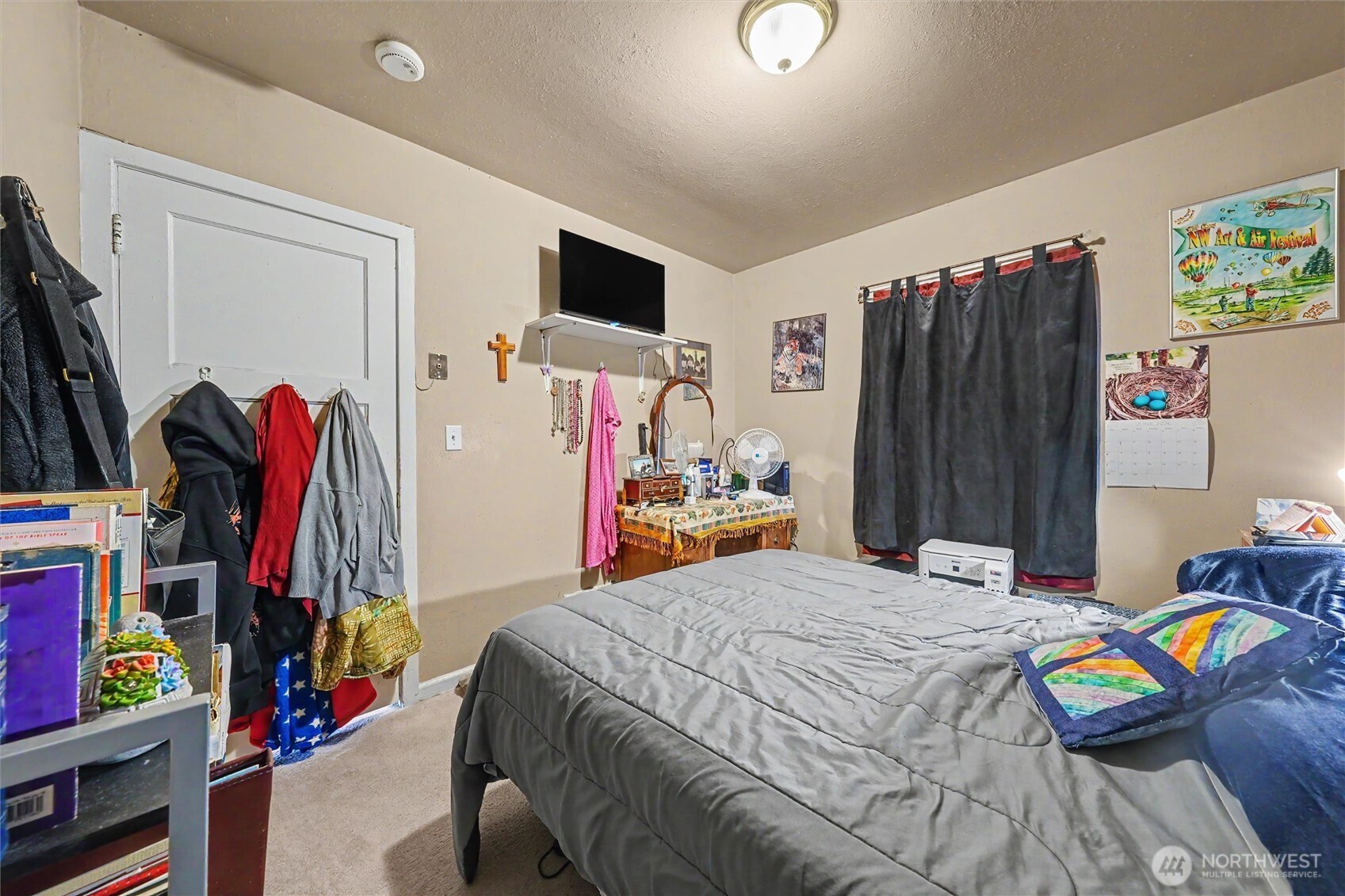 204 E Street Southwest Ephrata, WA 98823 - Photo 13 of 31 a bed room with a bed and a flat screen tv
