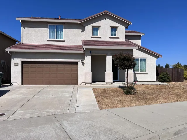 a house view with a outdoor space