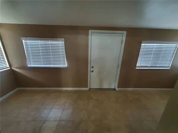 a view of livingroom with kitchen
