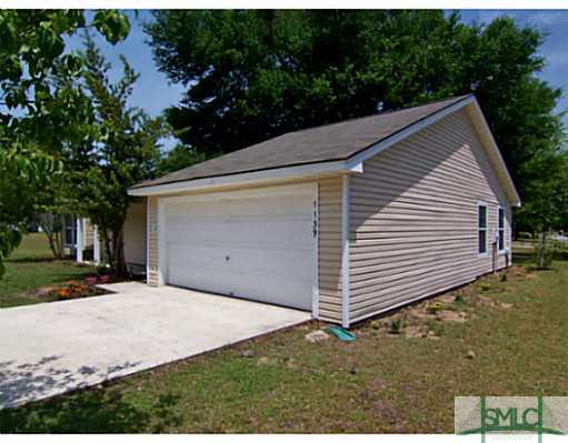 1139 Old Augusta Road South Rincon, GA 31326 - Photo 23 of 25 Exterior Front. View of attached garage