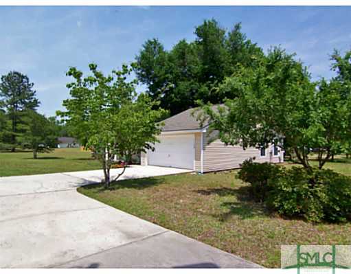 1139 Old Augusta Road South Rincon, GA 31326 - Photo 24 of 25 Exterior Front. Enjoy the shade an beauty of the m