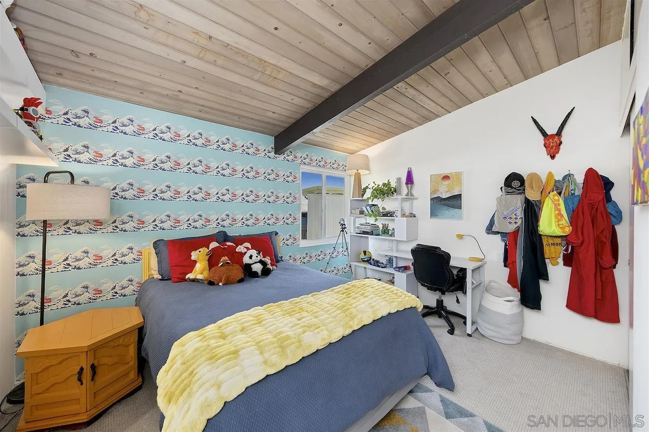 5635 Dartford Way San Diego, CA 92120 - Photo 15 of 26 a bedroom with furniture and a bed