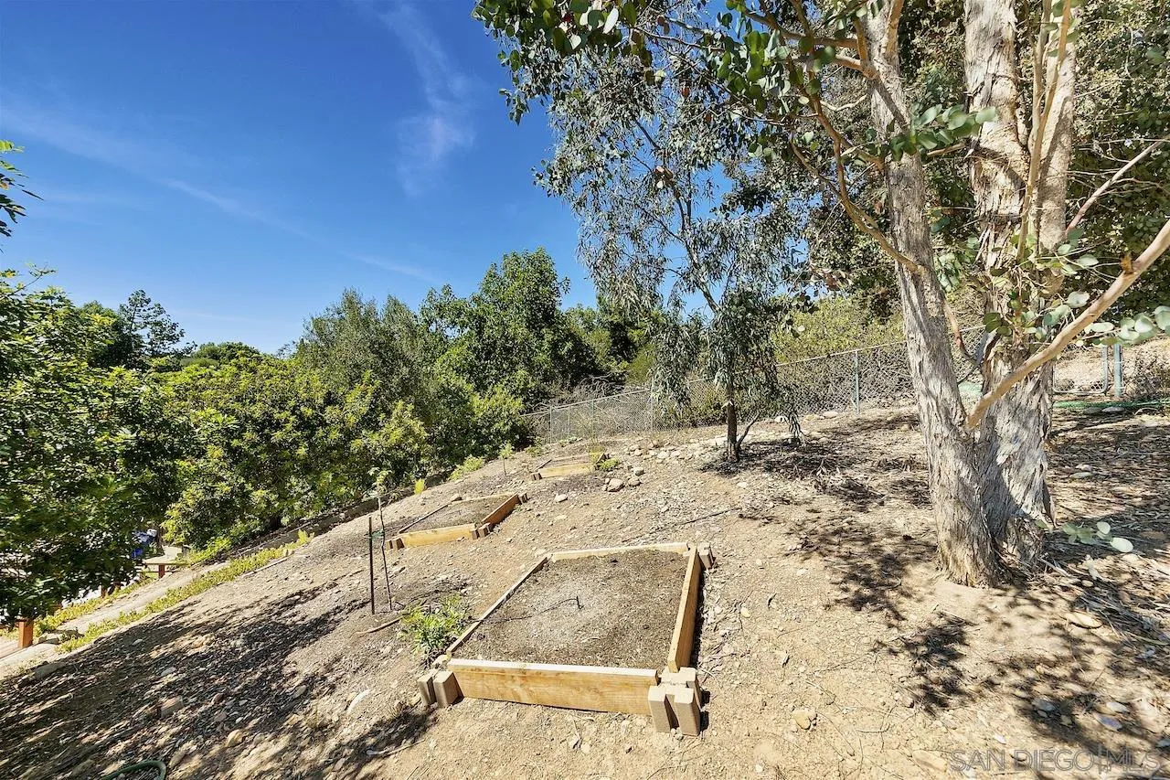 5635 Dartford Way San Diego, CA 92120 - Photo 26 of 26 a view of a yard with trees