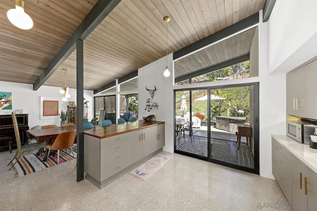 5635 Dartford Way San Diego, CA 92120 - Photo 7 of 26 a room with furniture and large windows