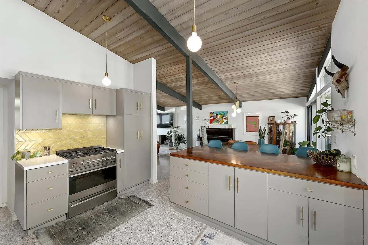 5635 Dartford Way San Diego, CA 92120 - Photo 10 of 26 a kitchen with a sink and cabinets