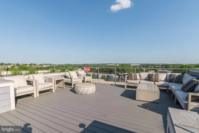a view of a terrace with furniture and outdoor space