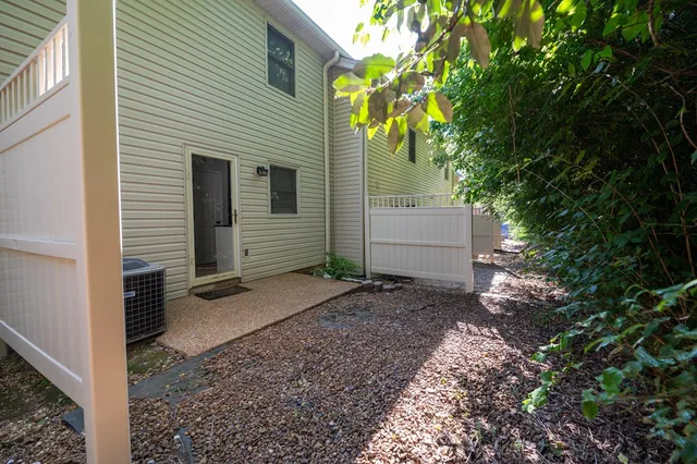 a view of a back yard of the house