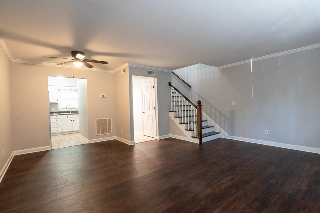 315 McBrien Road Chattanooga, TN 37411 - Photo 3 of 11 a view of an empty room with a window and wooden floor