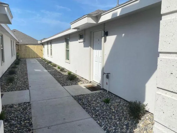 a view of a house with a patio