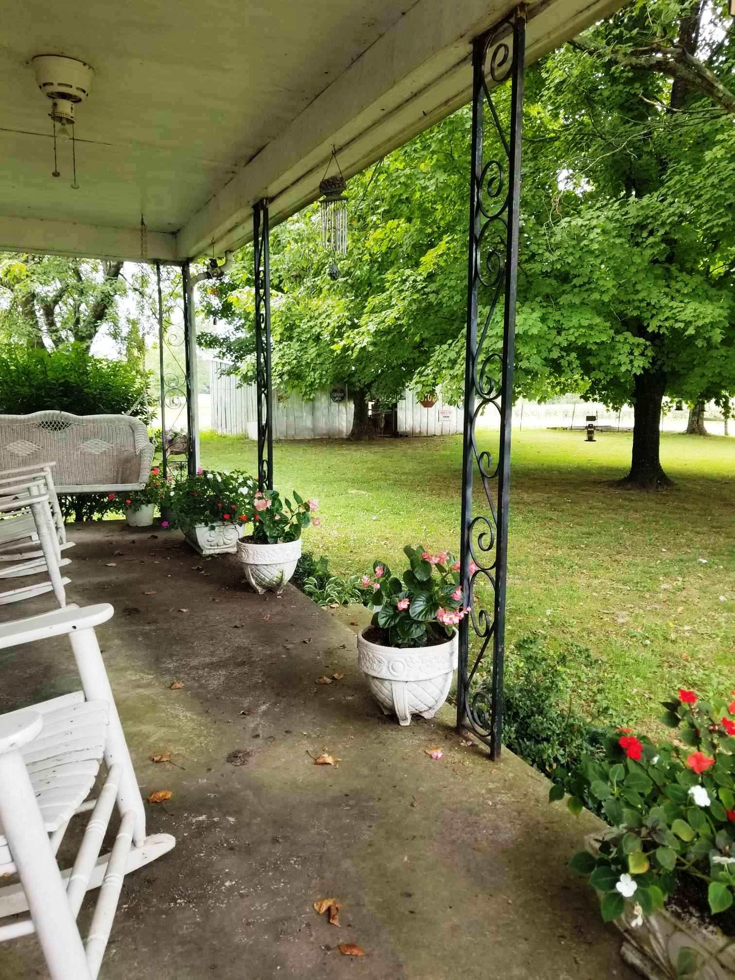 540 Parker Road Manchester, TN 37355 - Photo 13 of 30 a view of a porch with furniture and garden