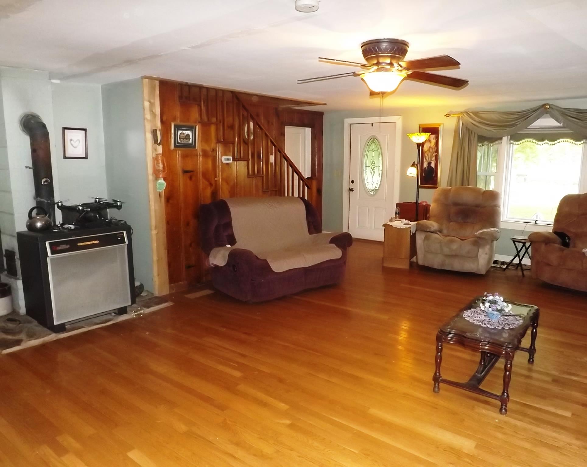 540 Parker Road Manchester, TN 37355 - Photo 16 of 30 a living room with furniture a chandelier and a window