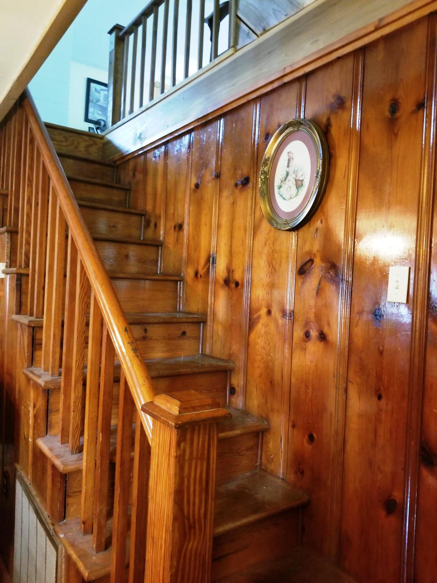 540 Parker Road Manchester, TN 37355 - Photo 23 of 30 a view of staircase with railing and a clock