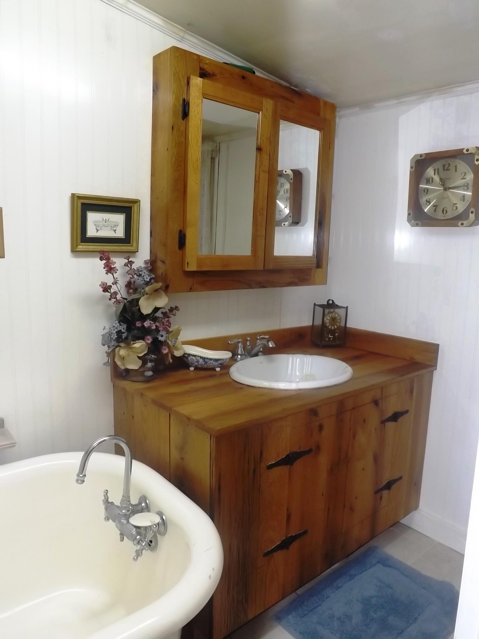 540 Parker Road Manchester, TN 37355 - Photo 27 of 30 a bathroom with a sink and a mirror