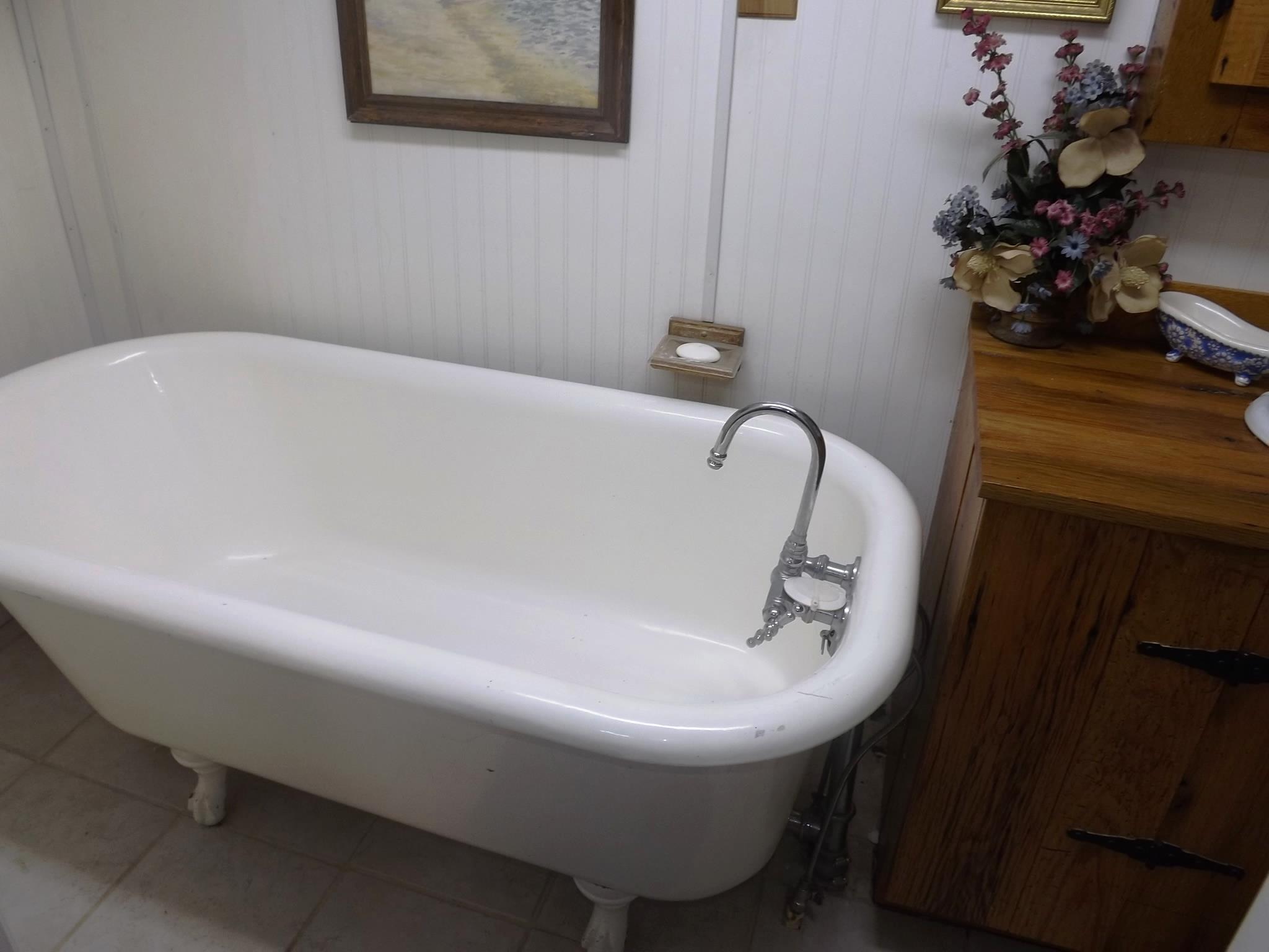 540 Parker Road Manchester, TN 37355 - Photo 28 of 30 a bath tub sitting in a bathroom