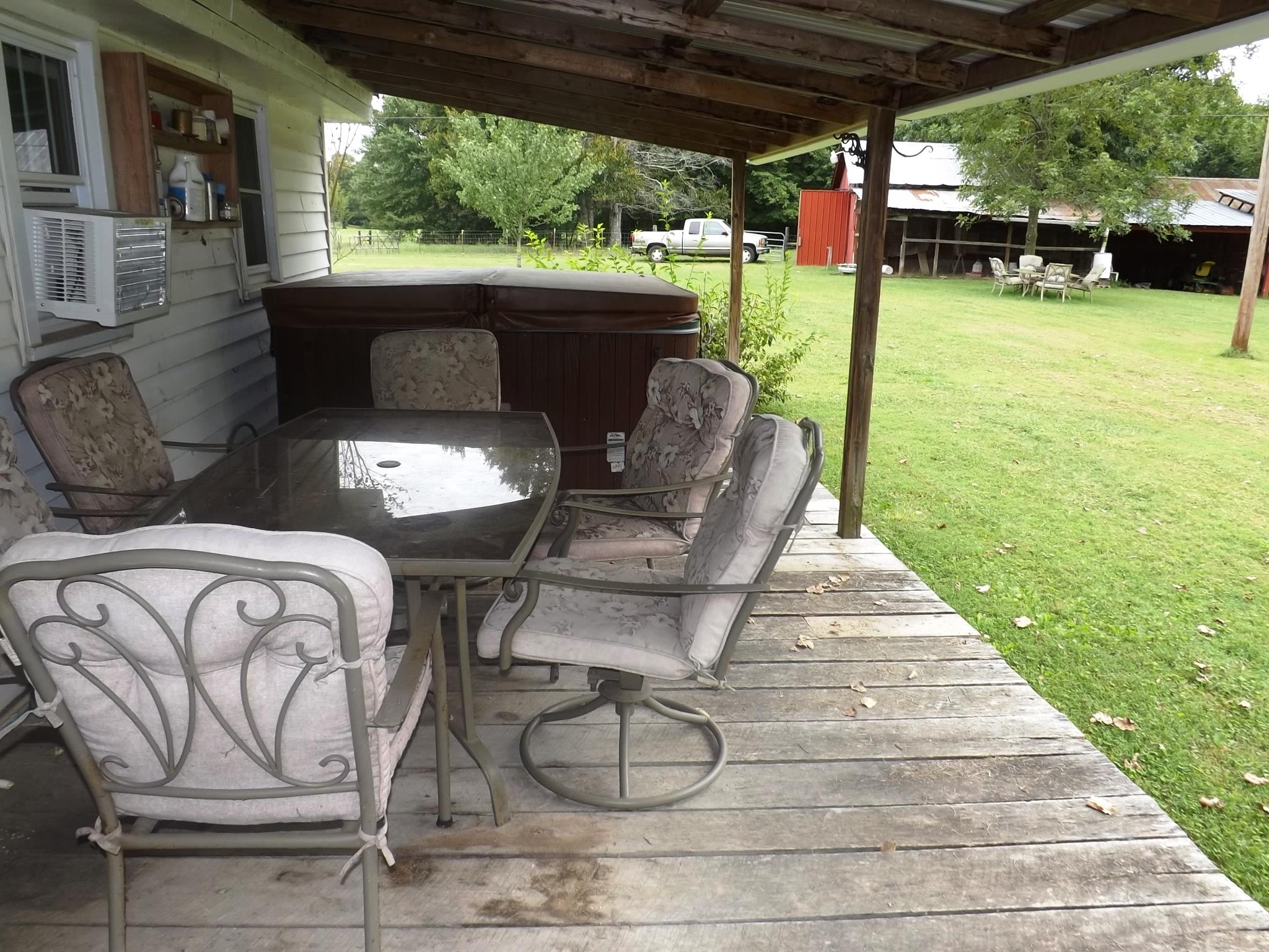 540 Parker Road Manchester, TN 37355 - Photo 30 of 30 a view of a porch with furniture and a yard
