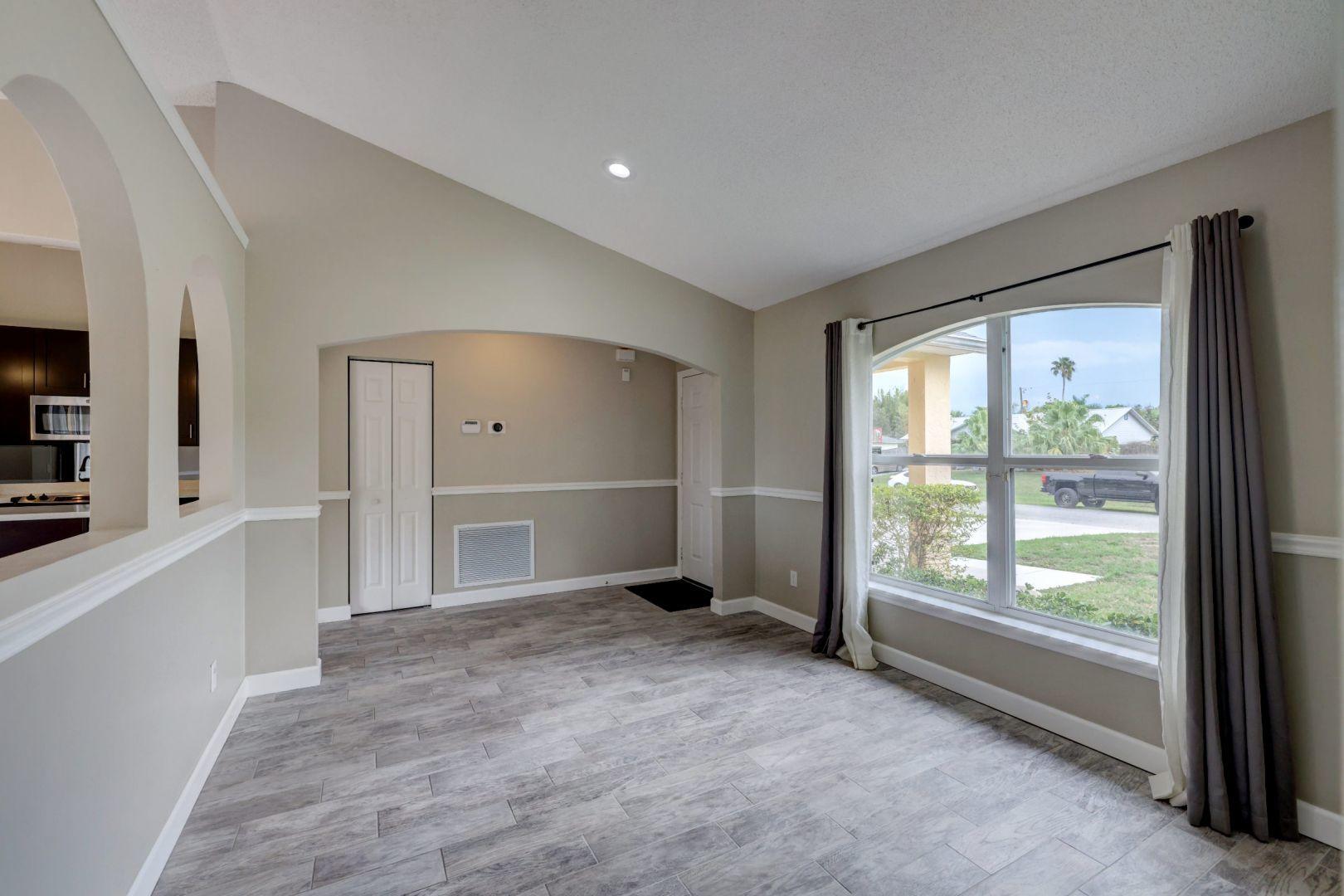 817 Southwest Commonwealth Road Port St. Lucie, FL 34953 - Photo 3 of 39 Living Room