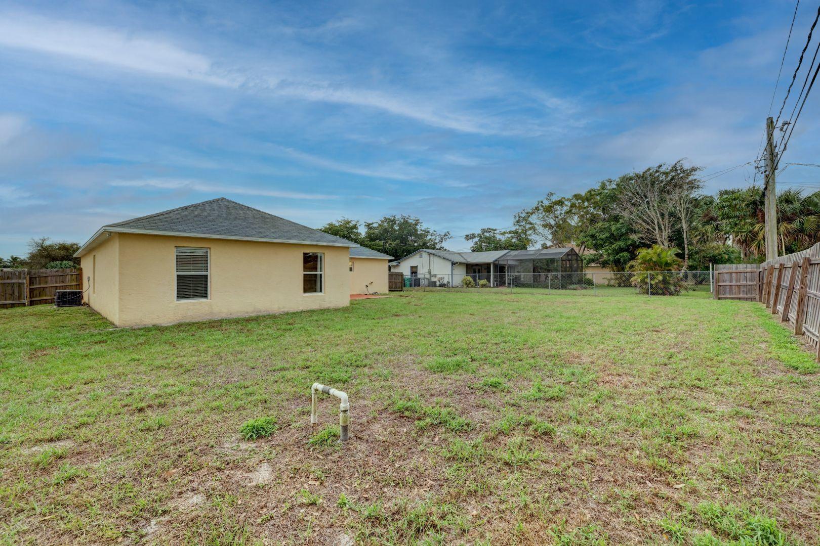 817 Southwest Commonwealth Road Port St. Lucie, FL 34953 - Photo 32 of 39 Yard