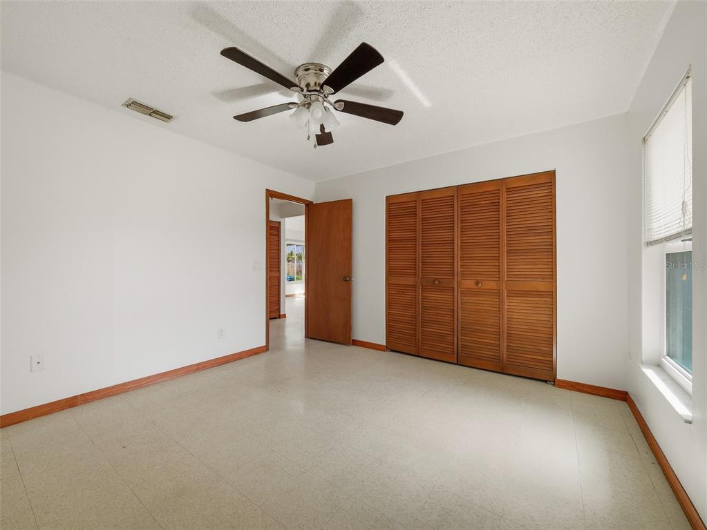 3303 Orange Tree Drive Edgewater, FL 32141 - Photo 25 of 33 a view of an empty room with a window