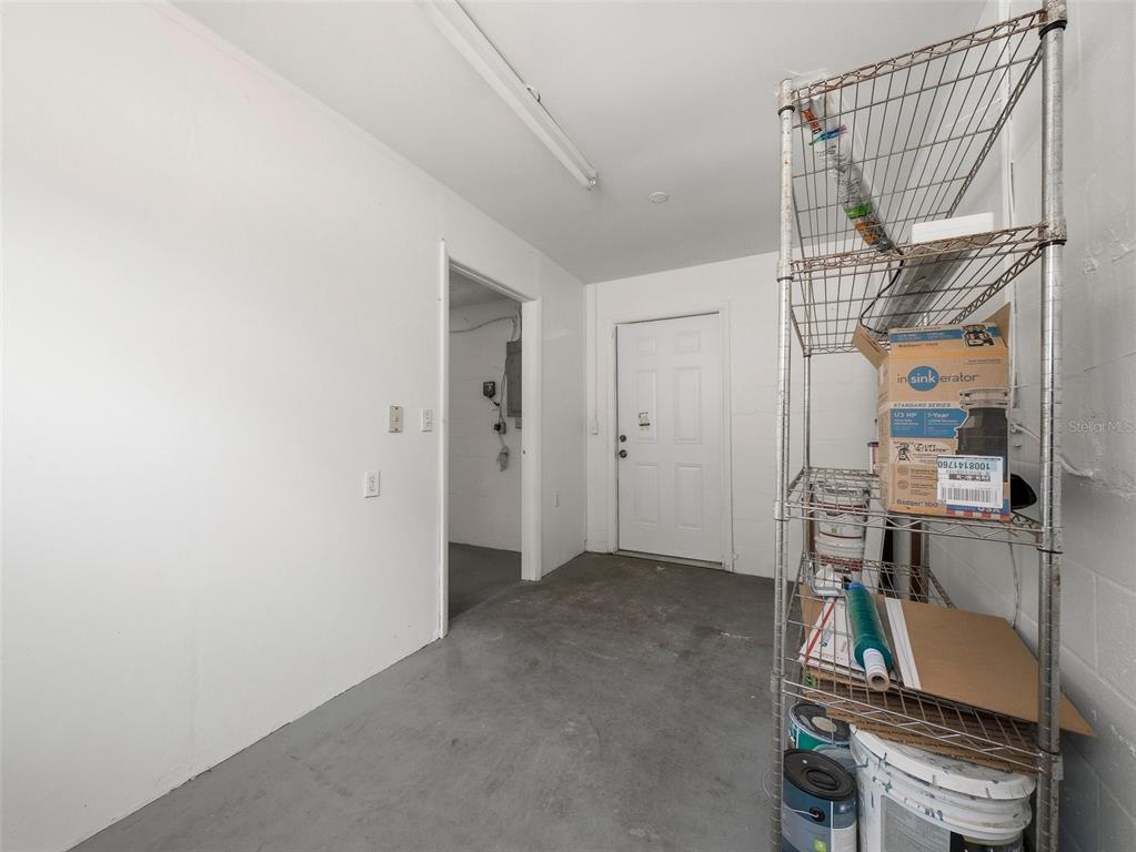 3303 Orange Tree Drive Edgewater, FL 32141 - Photo 30 of 33 a room with storage and utility
