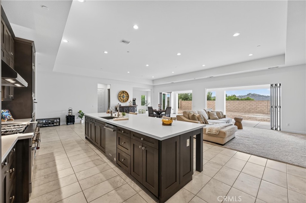 Ample counter space and cabinetry that stretches to the ceilings