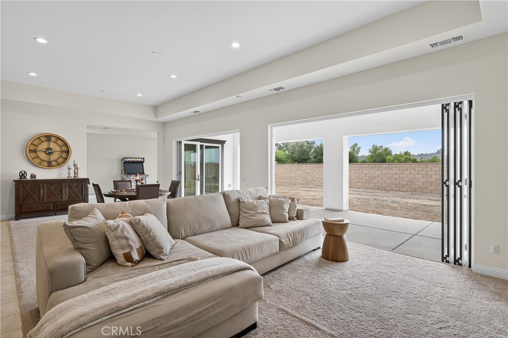 17549 Bretton Woods Place Riverside, CA 92504 - Photo 13 of 38 Main living room with accordion doors