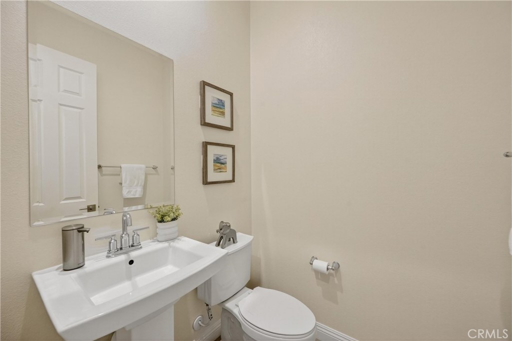 17549 Bretton Woods Place Riverside, CA 92504 - Photo 15 of 38 Guest half bath