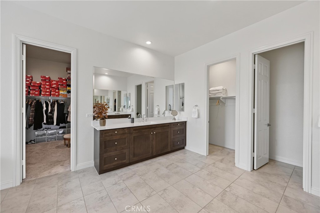 17549 Bretton Woods Place Riverside, CA 92504 - Photo 21 of 38 Left walk in closet is about 12 x 12