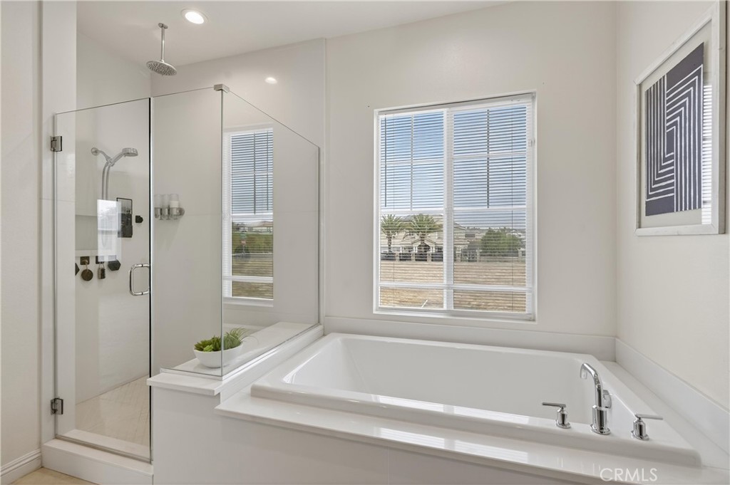 17549 Bretton Woods Place Riverside, CA 92504 - Photo 24 of 38 Fabulous soaking tub & stand up shower with bench