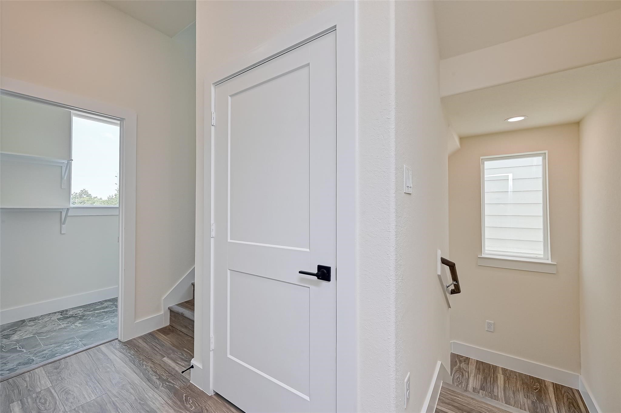 2905 Nagle Street Houston, TX 77004 - Photo 26 of 41 a view of room with window and hardwood floor