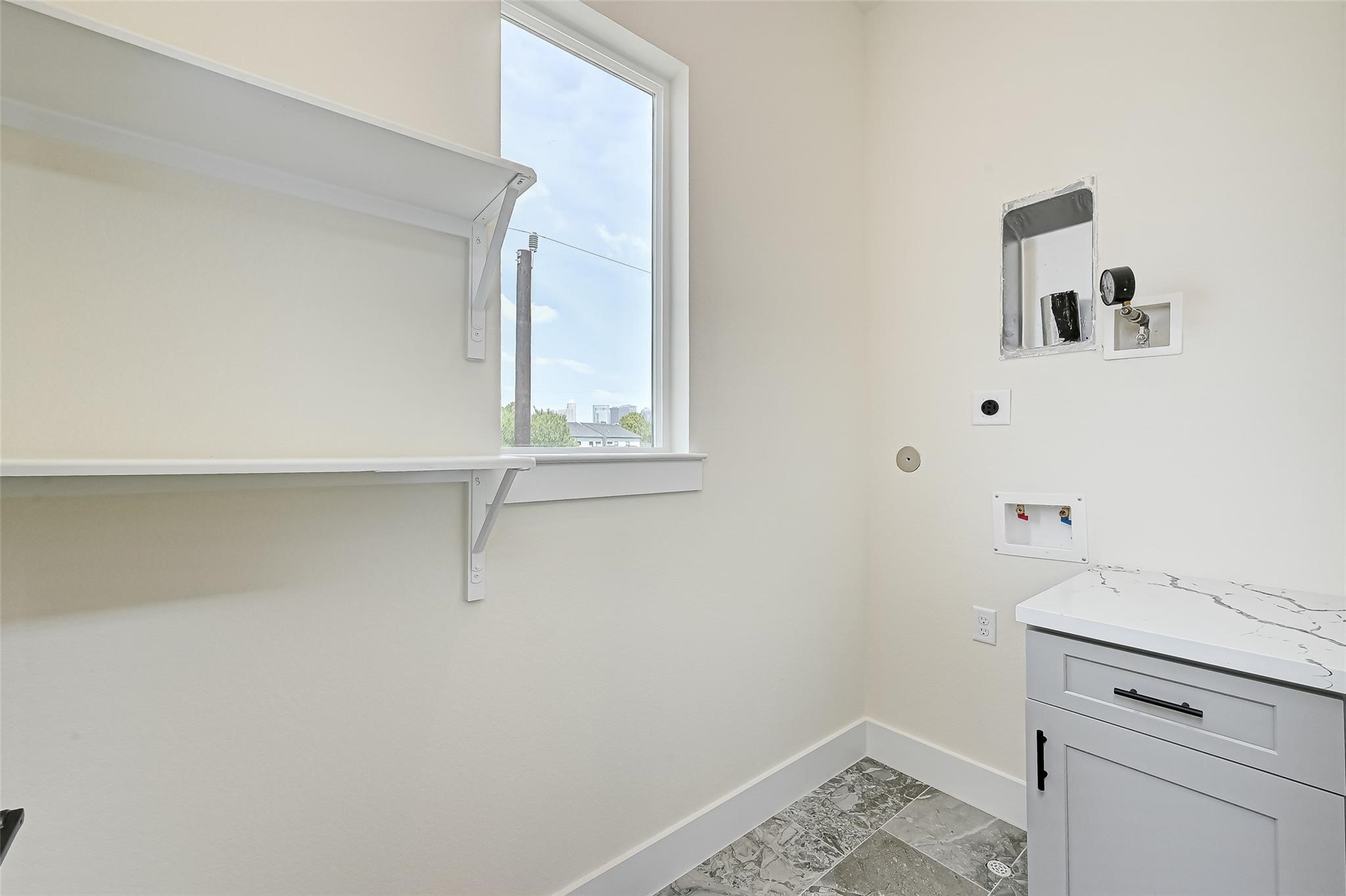 2905 Nagle Street Houston, TX 77004 - Photo 33 of 41 a bathroom with a sink and vanity