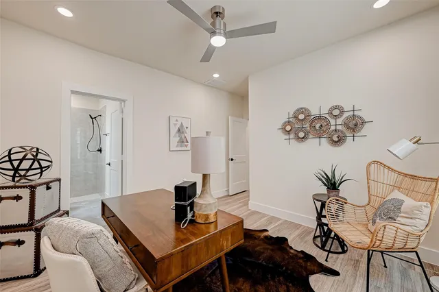 a living room with furniture and a table