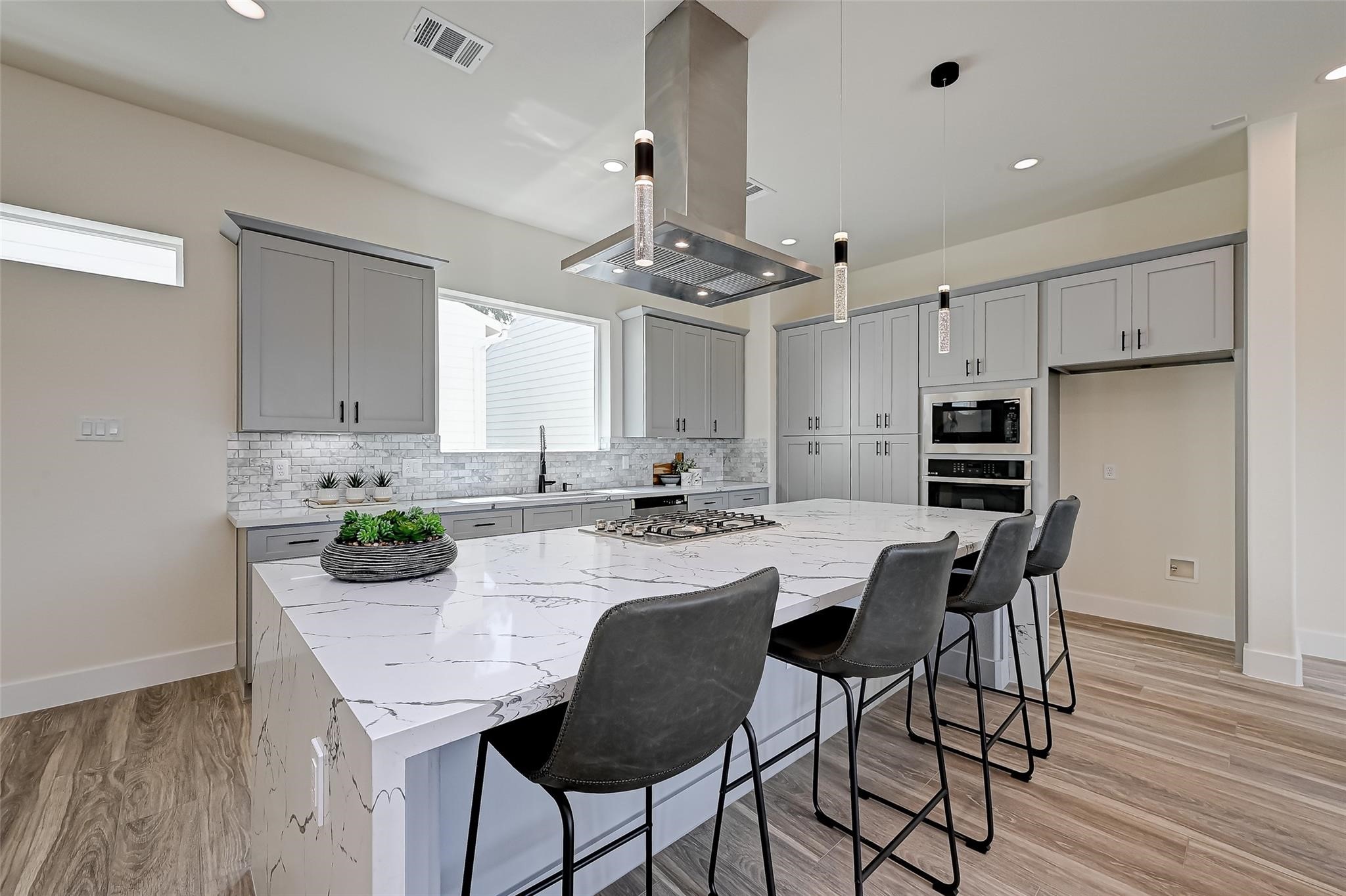 2905 Nagle Street Houston, TX 77004 - Photo 8 of 41 a view of a dining room with furniture and wooden floor