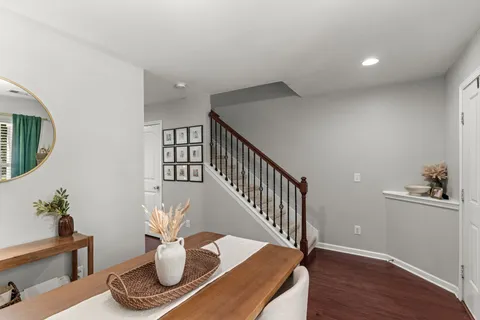 a view of a living room and hardwood floor