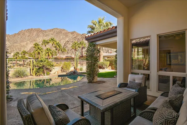 a view of a workspace with furniture