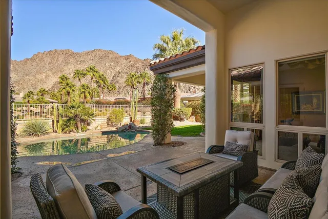 a view of a workspace with furniture