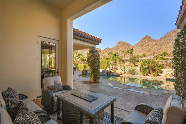a view of a living room and dining room