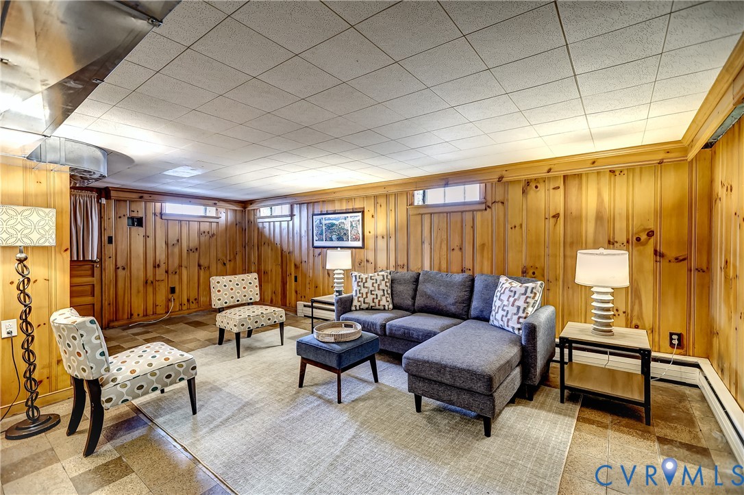 4814 Riverside Drive Richmond, VA 23225 - Photo 29 of 39 a living room with furniture and a wooden floor