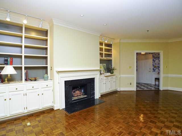 1612 Oberlin Road, Unit 7 Raleigh, NC 27608 - Photo 8 of 25 Gas burning fireplace with buildin cabinets and bookcases....