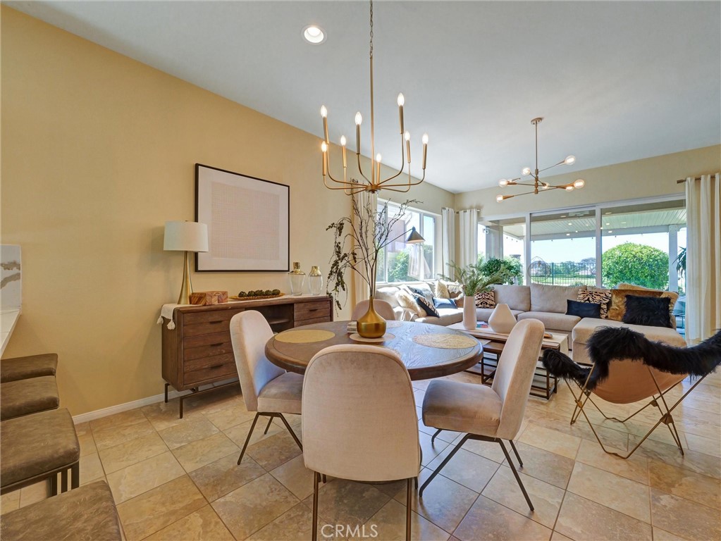 887 Westchester Road Beaumont, CA 92223 - Photo 14 of 41 a view of a dining room with furniture window and outside view